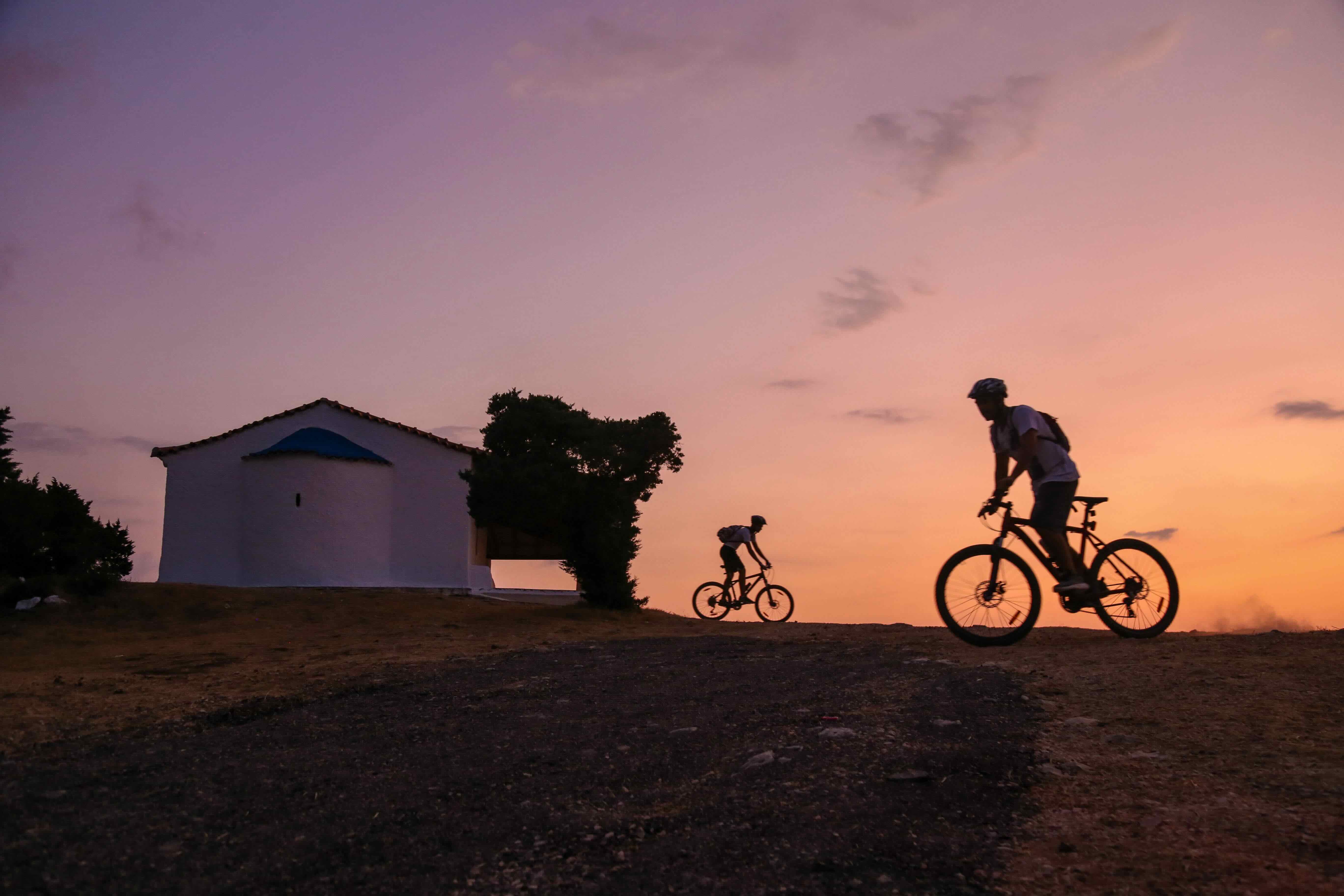 Kayakers paddling on the calm blue waters of Navarino Bay near Erodios Camping
