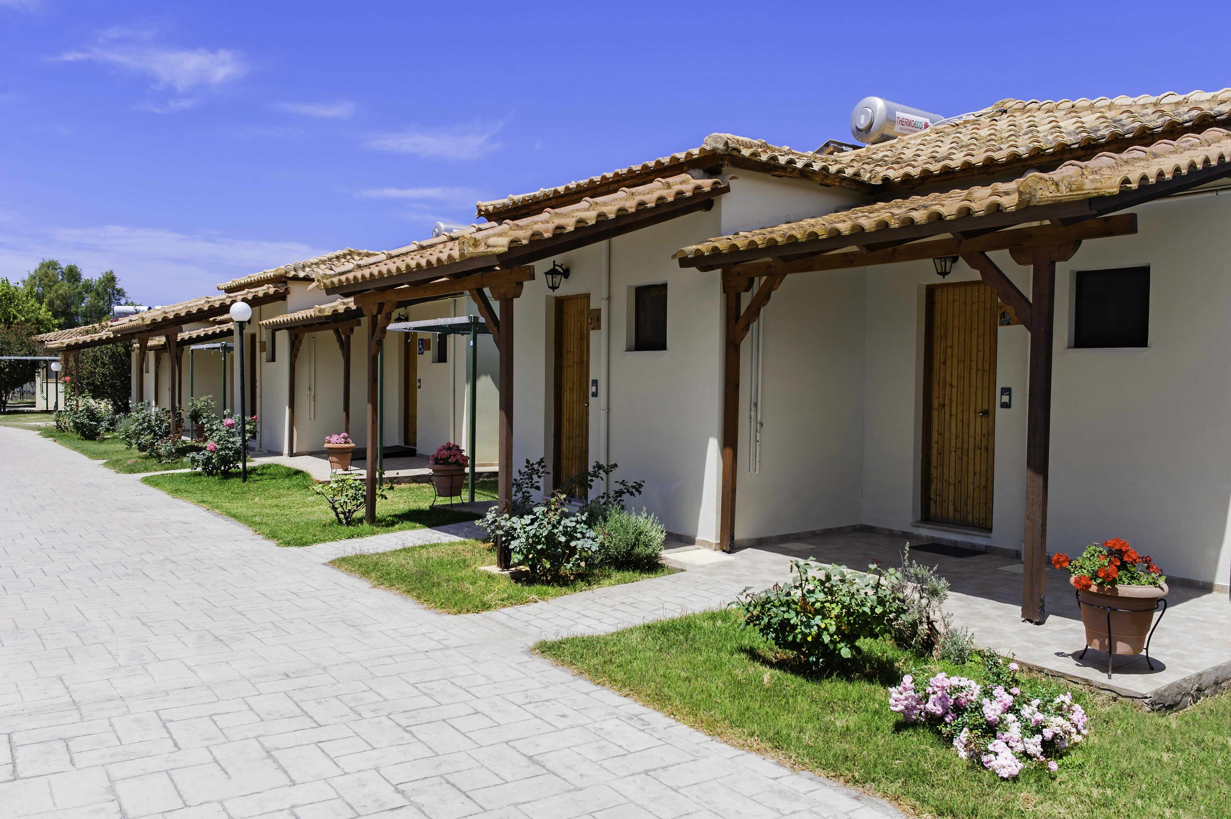 Comfortable bungalow room with garden view at Erodios Camping