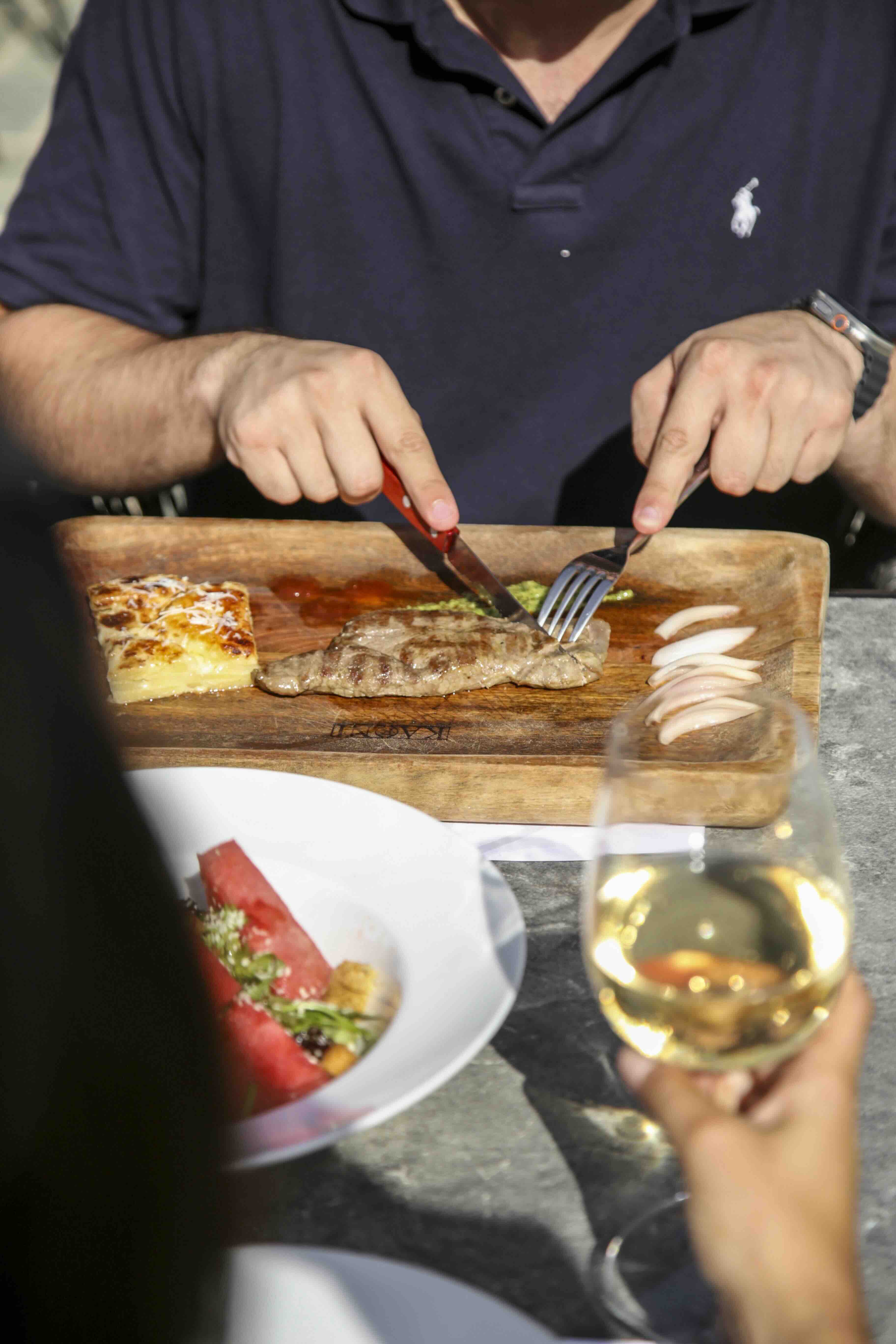 Greek mezze dishes served on an outdoor restaurant table at Erodios Camping